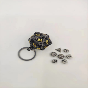 Porte Clés D20 : avec lot de 7 mini dés métal - Noir/Or